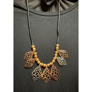 Y54 Multitone leaves on long black cord necklace